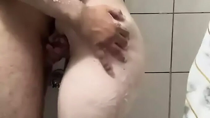 Amateur Turkish girl showers before school in homemade video