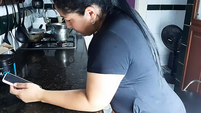 A teenage girl of Colombian descent alone in the house pleasures herself in the kitchen