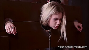 Teen blonde explores anal pleasure in the depths of the dungeon